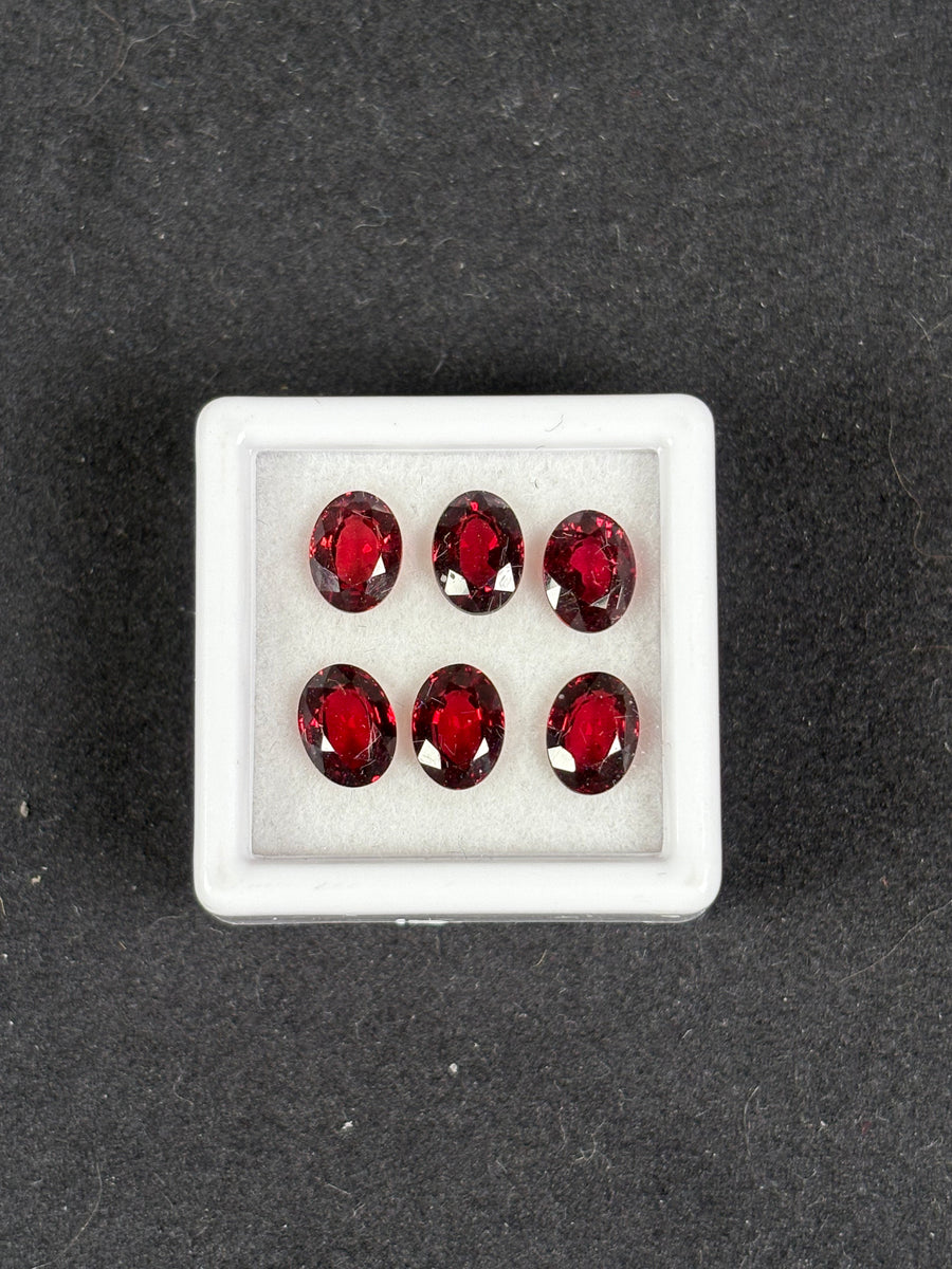 7.34ctw red rhodolite garnet lot, 6 oval stones, 7x5 mm