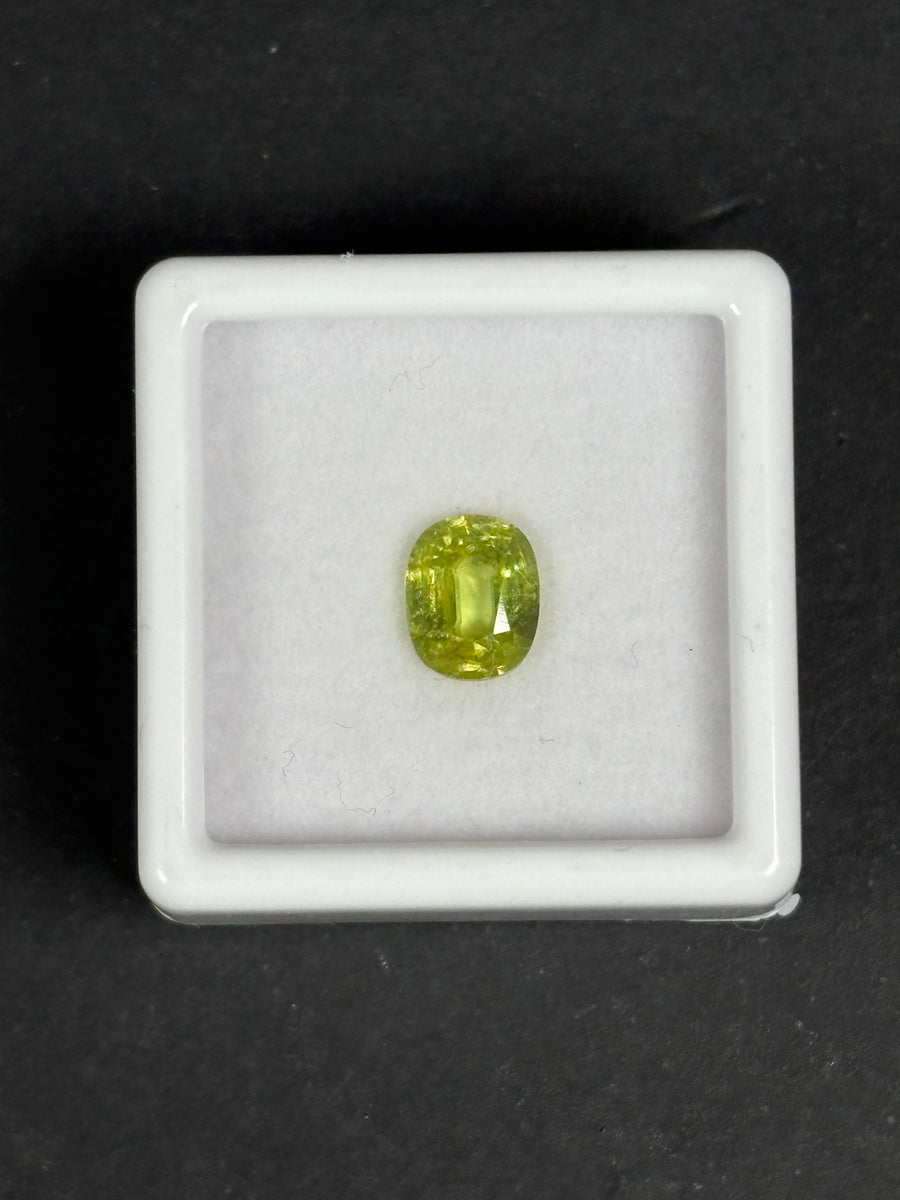 1.37ct Green Sphene, Oval, 7.3 x 6 x 3.6mm · GEM-6046
