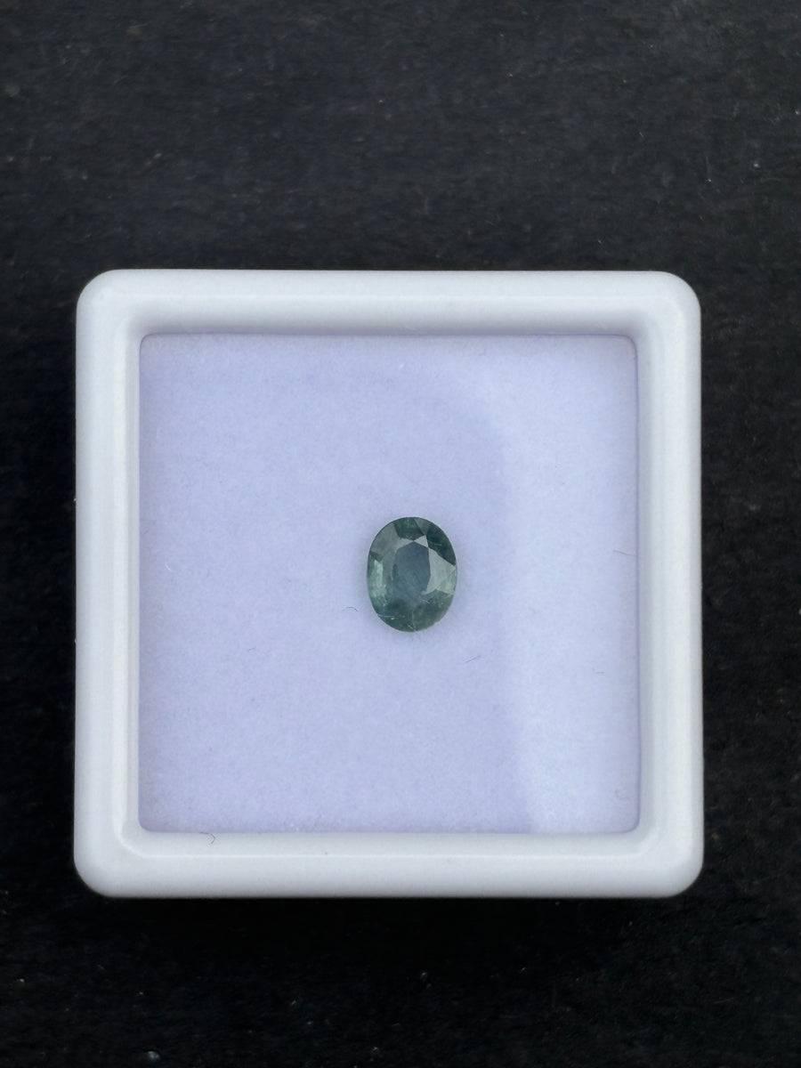 0.50ct heated blue green sapphire, oval cut, 5.42x4.27 mm