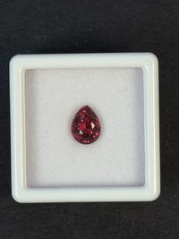 1.4ct Purplish Pink Rhodolite Garnet from Tanzania, Pear, VS, 7.5 x 5.8 x 4.2 mm (small chip) · GEM-7356