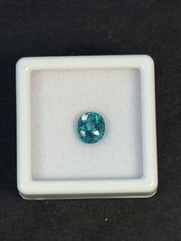 1.99ct Heated Blue Zircon from Cambodia, Oval, 6.7x5.8 mm, VS · GEM-7584