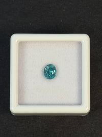 1.06ct Heated Greenish Blue Zircon from Cambodia, Oval, VVS, 5.5 x 4.5 x 4.0 mm (Small Chip) · GEM-7098