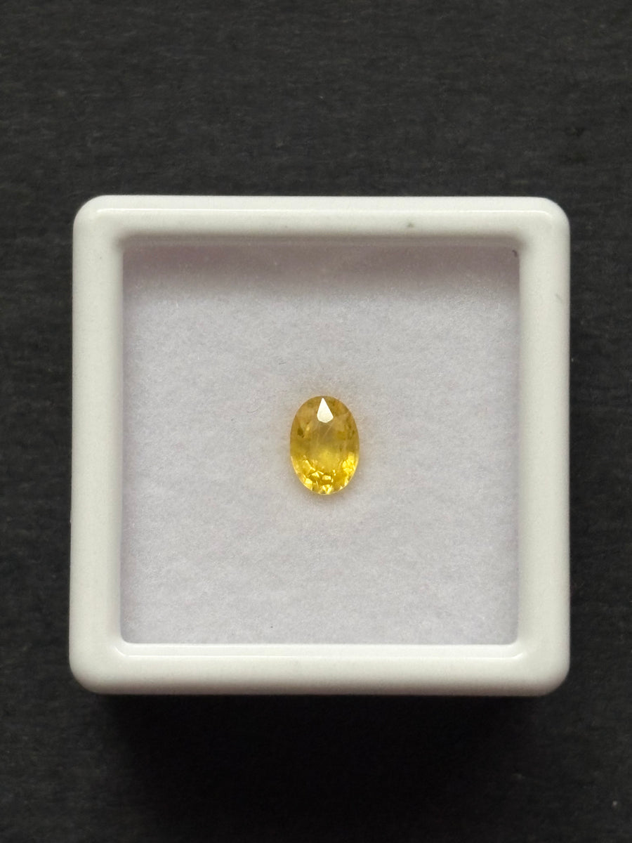 0.56ct heated yellow sapphire, oval cut