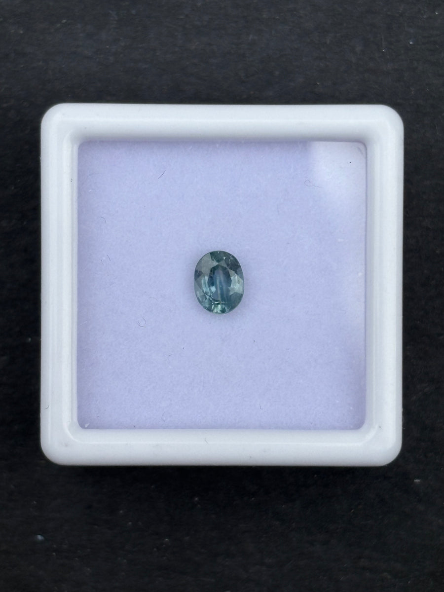0.52ct heated blue green sapphire, oval cut, 5.2x4.3 mm